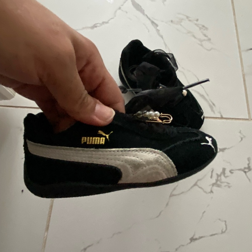 Puma Kids Black and Gold Sneakers